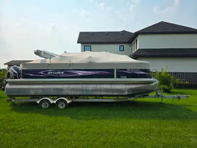 2011 Sylvan Mirage 22 foot party & fishing pontoon boat in excellent condition. 115hp Evinrude motor...