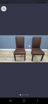 Two High Back Brown dining room chairs