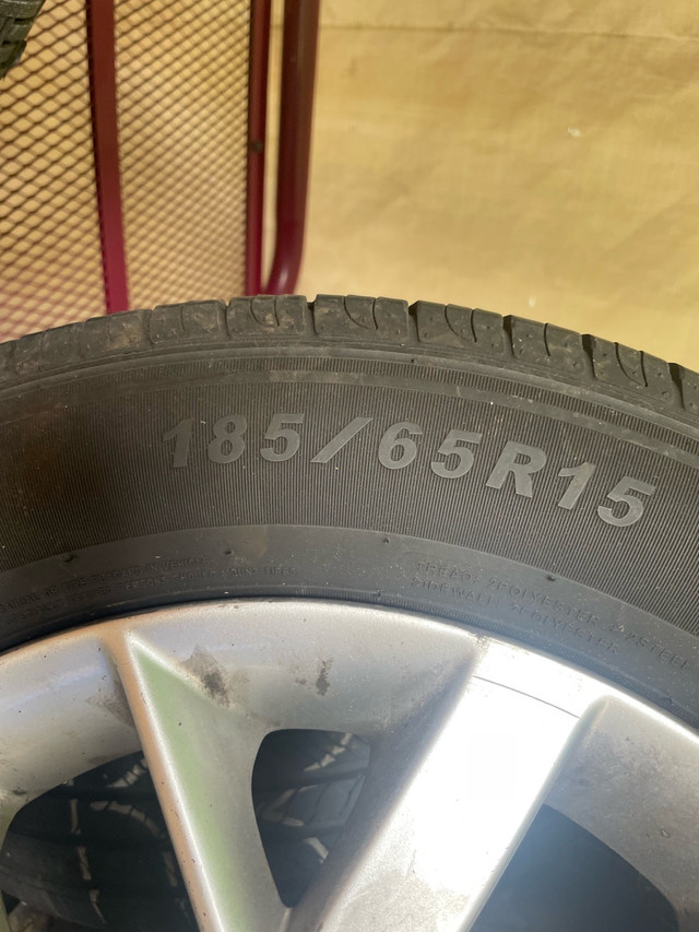 four 185/65 R16 summer tires on rimes in Tires & Rims in Fredericton