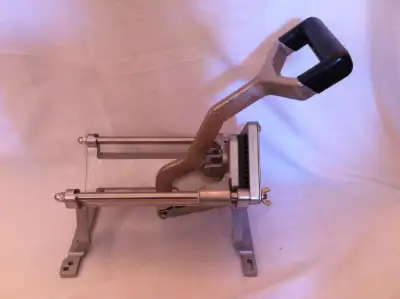 a professional Magnum | Deluxe Fry Cutter model 1020. this heavy duty piece was part of equipment wh...