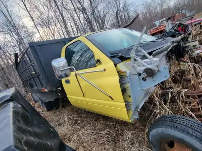 Dodge truck parts. dump truck box was working. newer pump only 3 years old. cab is salvageable, body...