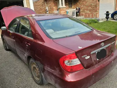 2003 TOYOTA CAMRY LE, SELING AS IS, CAR RUNS AND DRIVES ,FOR PARTS, ENGINE RUNNING GOOD, TRANSMISSIO...
