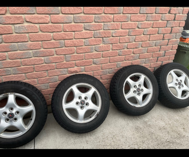 16” alloy rims with winter tires 5x115 in Tires & Rims in St. Catharines
