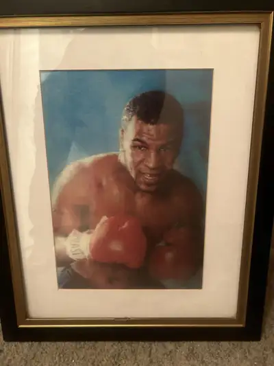 Own a piece of boxing history with this framed print of Mike Tyson. This vintage-style print capture...