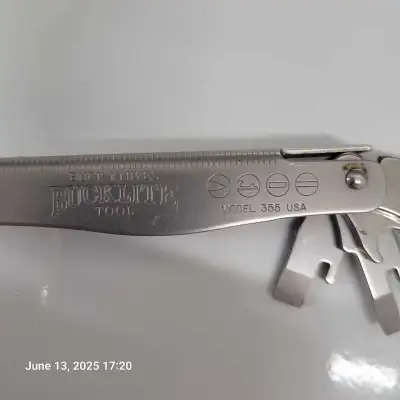 Buck multi-tool model 355. Locking tools. 3" sharp knife, 2 files, 3 flat head screw drivers, #2 Phi...