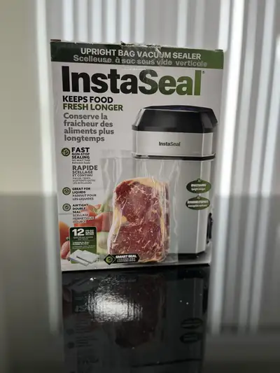 I'm selling a new InstaSeal Upright Bag Vacuum Sealer in an open box. It doesn’t come with the pre-c...