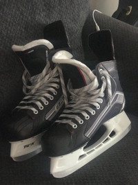 Skates / hockey stick 