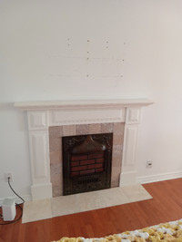 fireplace mantle and cast iron frontpiece