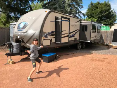 32 foot sunset Trail with Remo oats, indoor and outdoor TV fireplace outdoor shower, outdoor fridge...