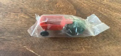 Am selling my Lesney, Vintage Matchbox 1955 Wheelbarrow Tractor w/ Metal Wheels Sealed, never opened...