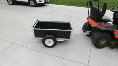 Hi Folks... Have up for sale a small utility trailer for your lawn tractor or golf cart. Has a remov...