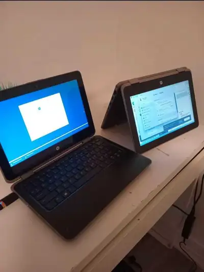 Hp touchscreen laptop Convertible laptop with a 12 inch screen. This laptop is in great condition an...