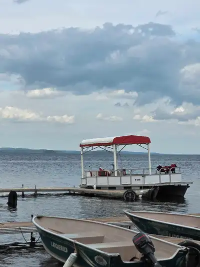 70 Hp Evinrude 1990 on it Runs well. Available to see June 1st @ Rice Lake Town of Bewdley,On Open f...