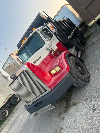 Runs drives operate. Can move mountains! Newer box and hoist. 20k front 20k lift axle 46k rear end 1...