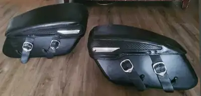 Harley Road King leather saddlebags in great condition. Hard shells, classic weave tops, and chrome...