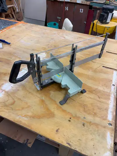 Manual mitre saw. 0 to 45 deg. Good for baseboards and small projects. Cash only. $20 obo Ron 780466...