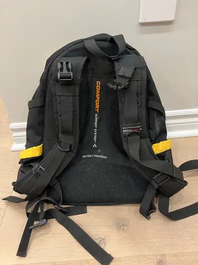 Lots of zippers and clips, all working, and thick padding for back support.