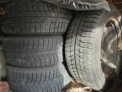 Like new winter tires 205 55 R16. On rims with 5 bolt pattern 4.25in