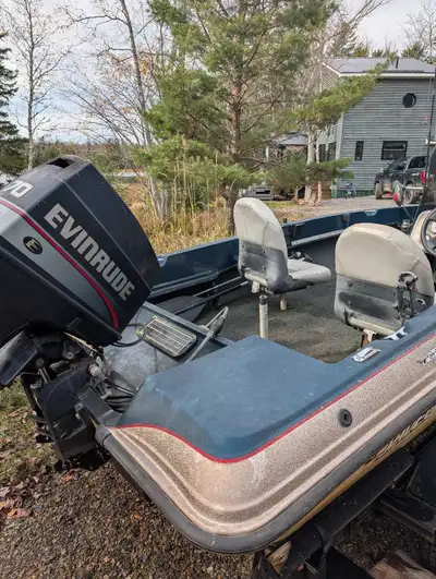 Javelyn boat with 70 HP Evinrude. Not sure of year of the boat or motor. Motor tuned up this summer....