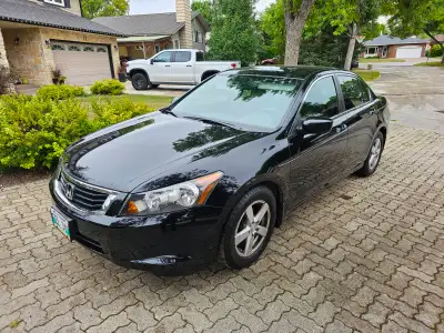 This 2009 Honda Accord sedan is in excellent condition and has recently passed a safety inspection,...
