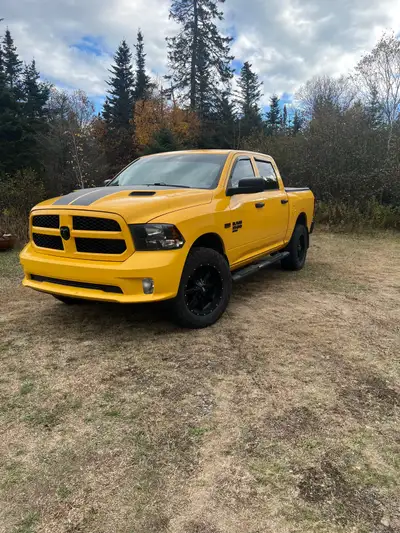 19 ram classic 5.7 with aftermarket exhaust, cold air intake, throttle sensitivity booster, leveling...