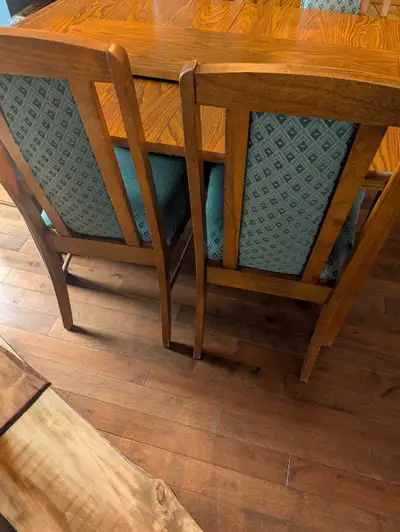 Solid wood china cabinet and chairs. Table combonation . excellent condition c/w leaf for table.