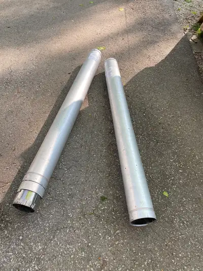 Two 5 foot sections of type 5L 60 stove pipe Slightly used
