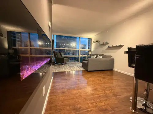 Experience upscale urban living in this elegant 1,078 sq. ft. condo located in the prestigious Wall...