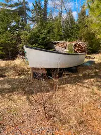 For sale 18 foot wooden/ fibreglass boat .
