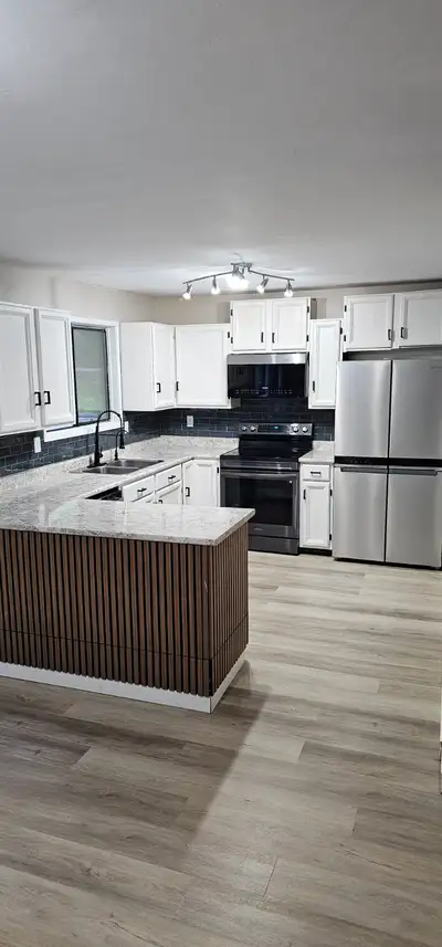 Bright and spacious 2-bedroom top floor unit available in a well-maintained duplex located in a desi...