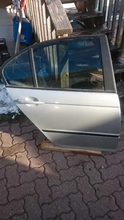 BMW rear passenger door from e46 model, 4 door sedan. This door has no rust and is in excellent shap...