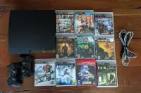 PS3 Slim with 2 controllers and 10 games