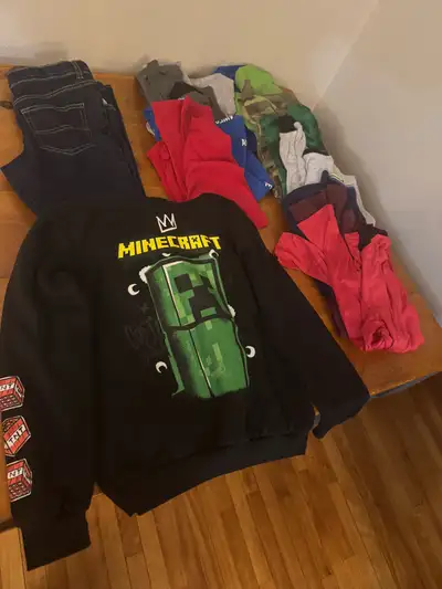 Size 10-12 1 New pair of Jeans 1 new MINDCRAFT Sweatshirt 13 long and short sleeved shirts (most new...