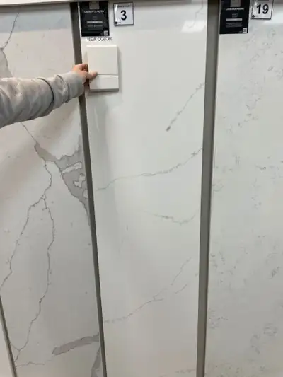 Upgrade your space with this stunning, brand-new Calacatta Ultra quartz slab, featuring a crisp whit...