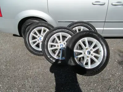 225/65/17 tires and rims came off 2014 Dodge Journey 8/32 tread left. Very good set for $600.00. Tir...