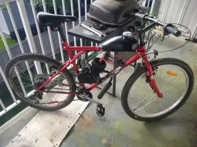 Motorized Mountain Dirt Bike. Includes bike cargo rack, computer. On a GT mountain bike 21 speed cha...