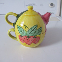 FS:  A Teapot, Creamer and Sugar Dish