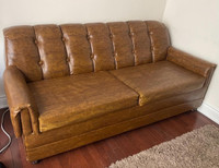 Leather couch with bed