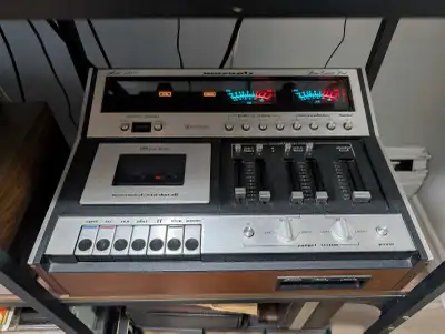 Vintage tape deck with microphone inputs and recording features. Very cool looking and rare model, s...