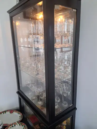 Coffee table,one end table and lighted curio cabinet, View more
