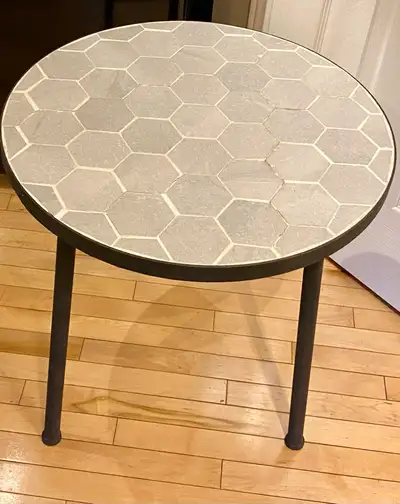 Add a touch of modern elegance to your living space with this stylish tile-topped side table. Perfec...