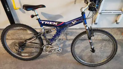 Trek mountain bike. Previous rider was 5'8". 26" wheel size. Gears need some tuning.