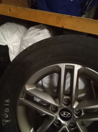 235/65R17 Hyundai discs and all season tire