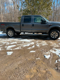 2008 Ford F350 with Plow