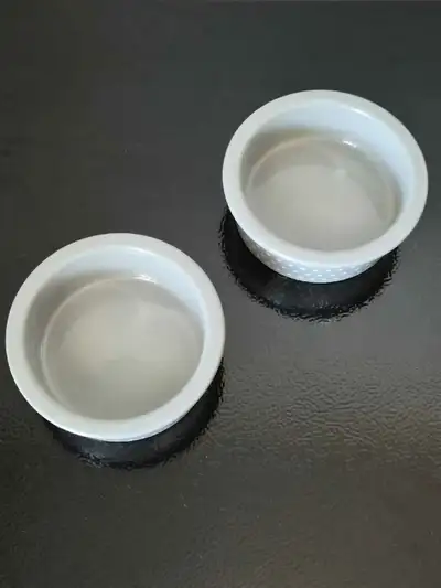 Read Bio | Pair Of Small Whisker City Cat Bowls, View more