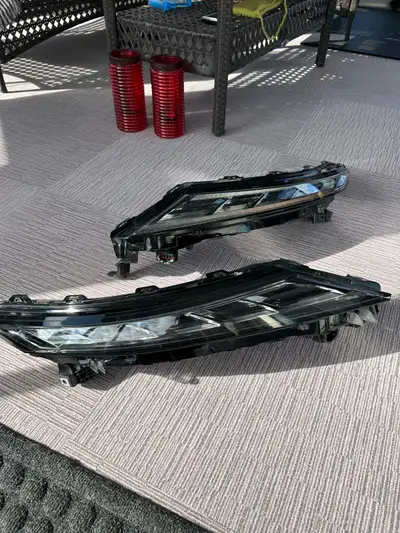 I am selling a pair of Mitsubishi Outlander OEM Day Running Lights, part numbers 8310A043 and 8310A0...