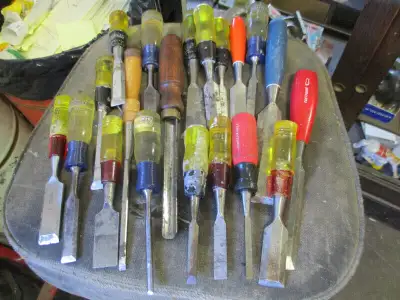 The long wood lathe chisel has been sold plus the red handle FOOTPRINT one as well......Selling quic...