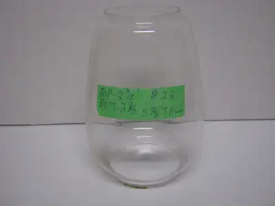 Clear, Thin Glass. No imperfections in glass, but 3 "flea bites" on bottom rim. 2 3/8" top dia. x 2...