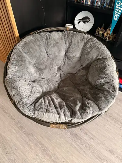 Super comfortable papasan chair with a soft, plush grey cushion. Perfect for reading, relaxing, or a...