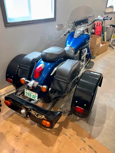 2009 Kawasaki Vulcan 900 with easy on trike kit. This bike has always been stored inside and is in e...